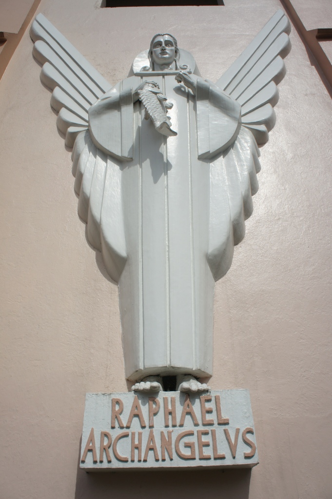 Bas relief of Saint Raphael at the facade of Saint Raphael Church in Legazpi City